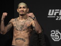 할로웨이, 오르테가에 4R TKO…UFC 13연승